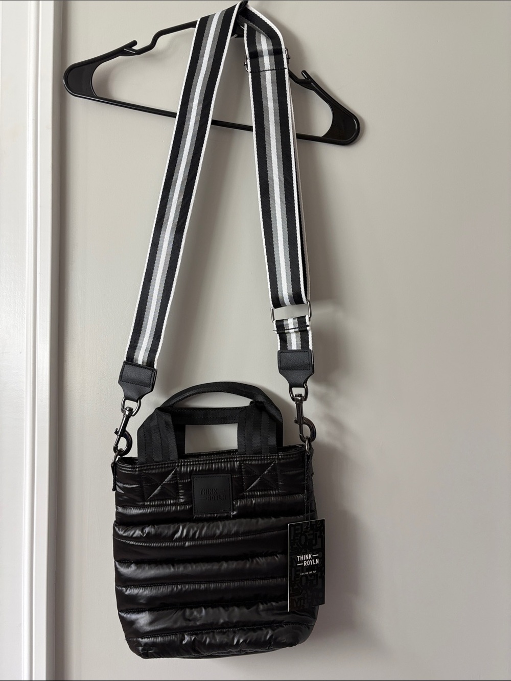 THINK ROYLN Black Quilted Crossbody Bag with Striped Strap